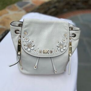 Michael Kors Evie Leather Backpack.  Color: White with Flower Embellishment